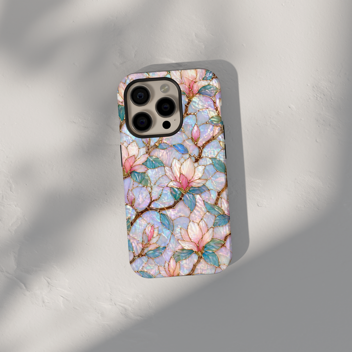 Magnolia floral Samsung Galaxy S26 Ultra case with iridescent pearl tones and gold-lined stained glass design.