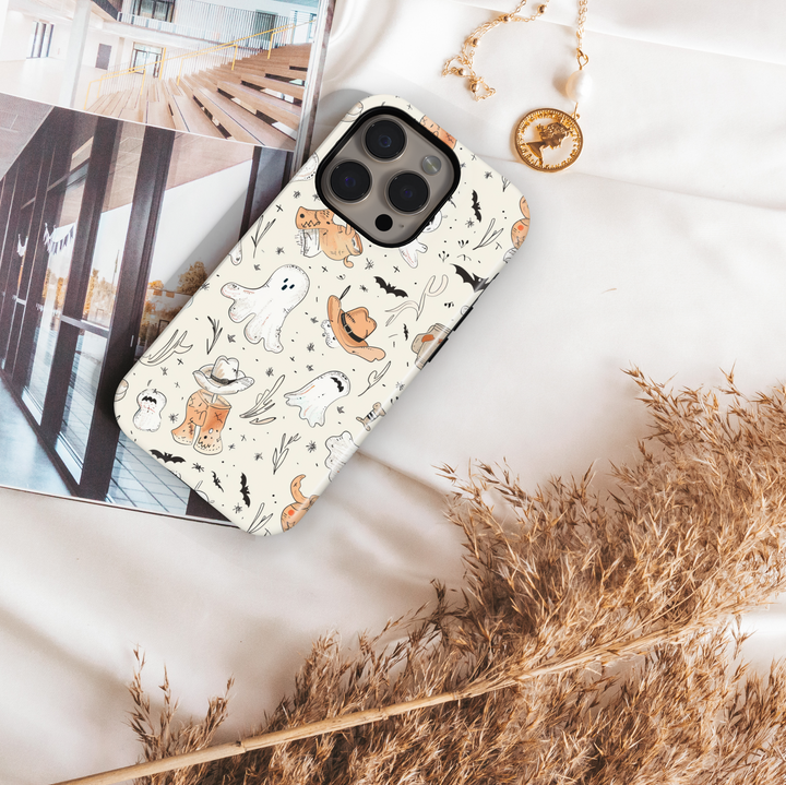 Halloween phone case with western cowboy ghost design, featuring cute ghosts in hats, boots, and bats on a cream background – protective iPhone and Samsung Galaxy cov