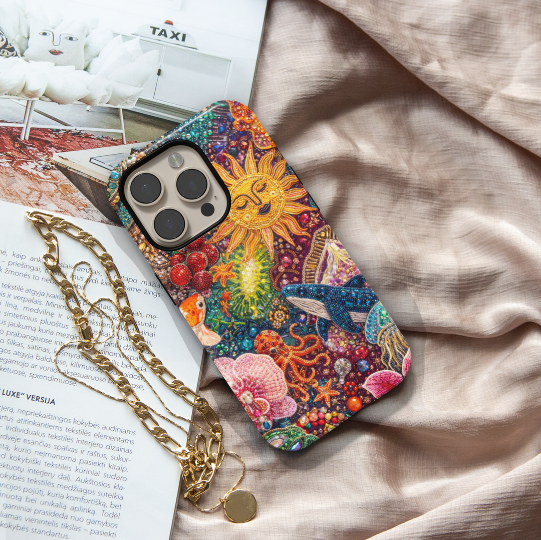 Colorful ocean phone case with jeweled sun, whale, octopus and sparkling sea life design, protective tough case for iPhone and Samsung Galaxy
