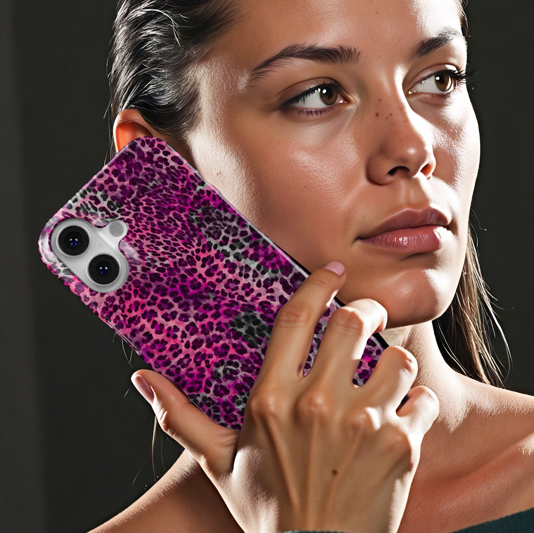 Hot pink leopard print phone case with purple and black animal spots, trendy chic aesthetic protective cover for iPhone and Samsung