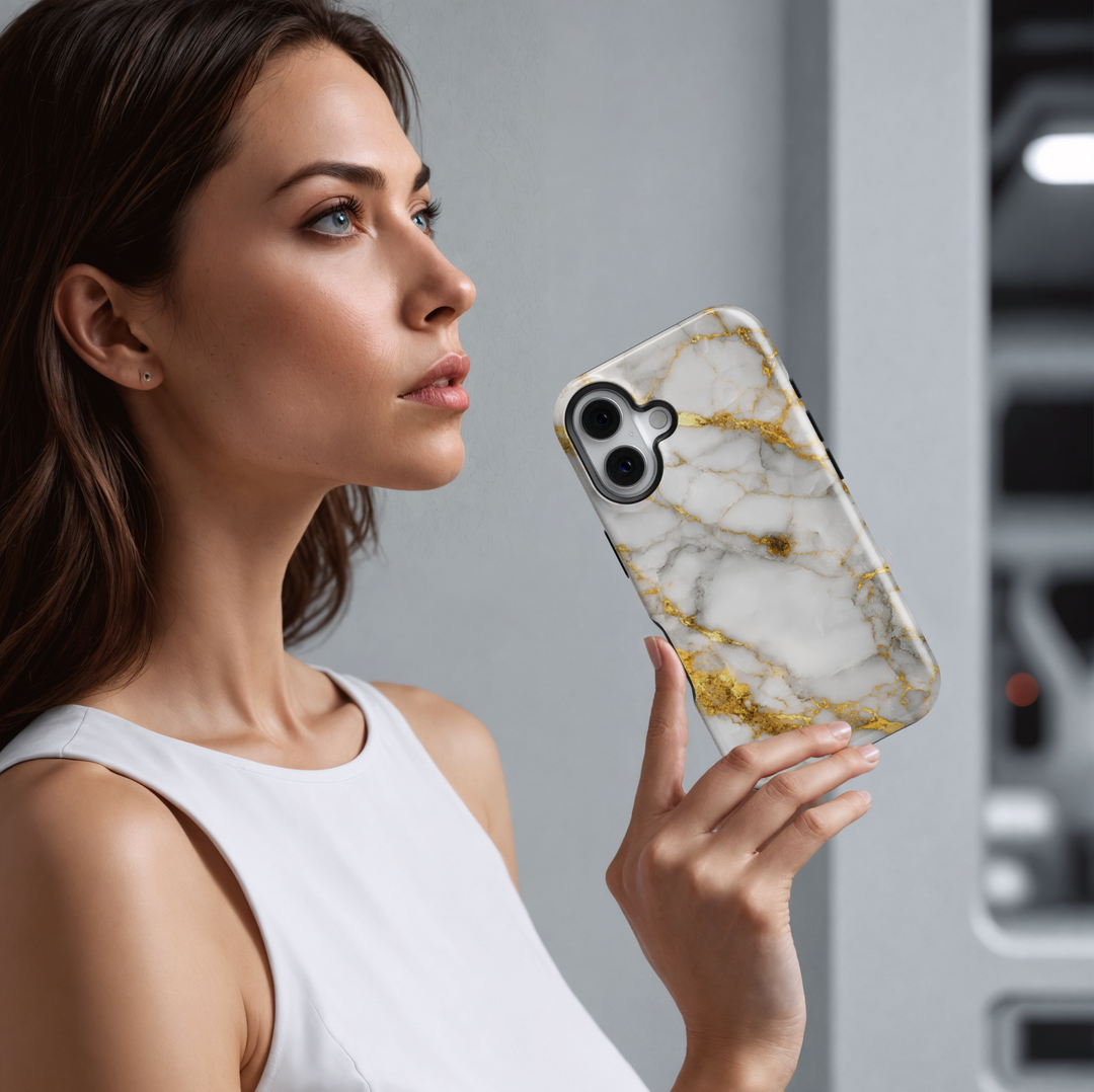 Elegant white marble iPhone case with gold vein accents – luxury stone design cover compatible with iPhone 16, 15, 14 Pro & Plus with MagSafe support.