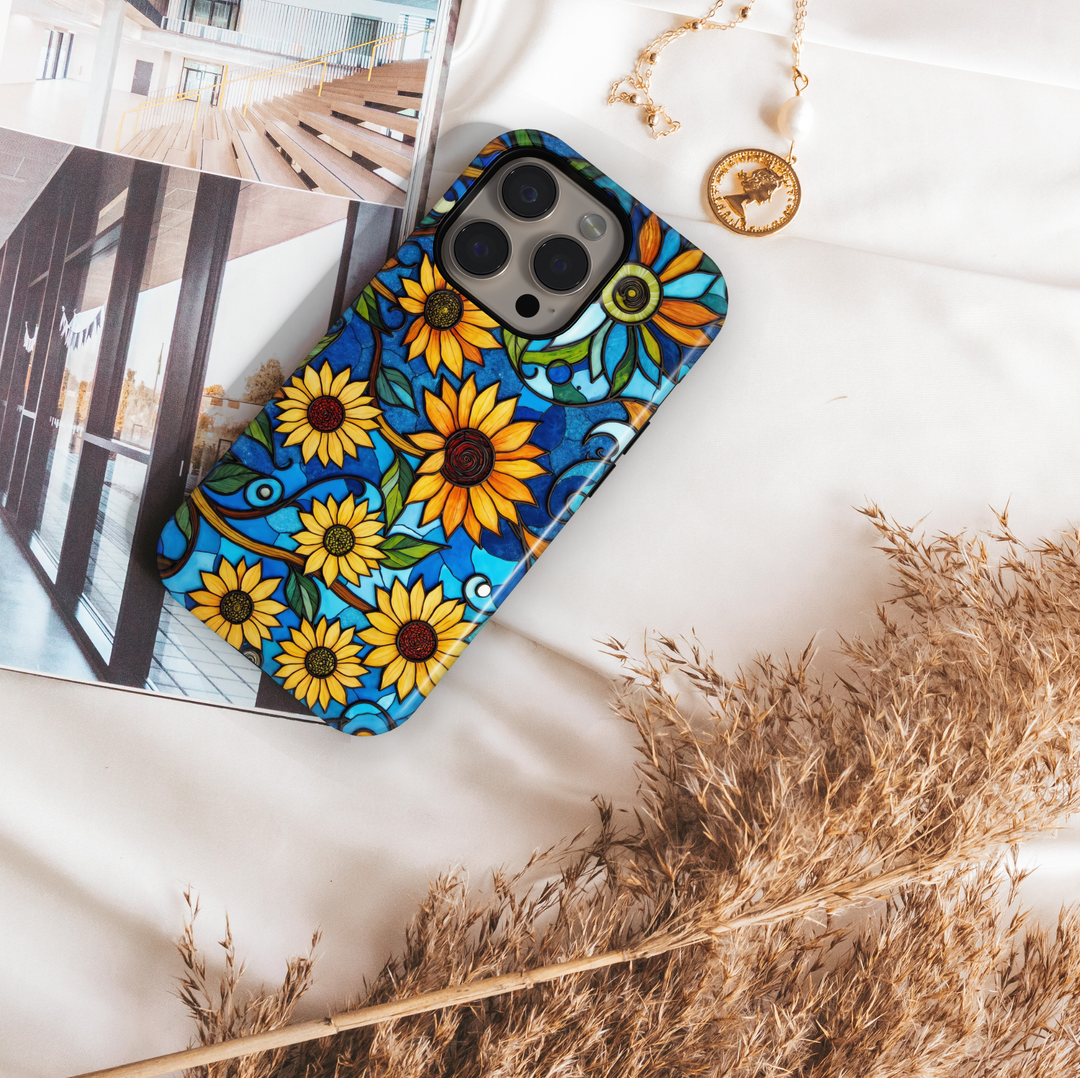 Stained glass sunflower iPhone tough case with bright yellow flowers and swirling blue background