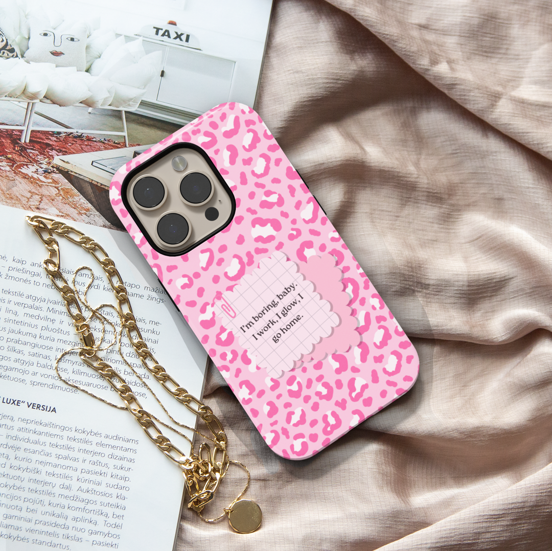 Pink leopard aesthetic phone case with bold lifestyle quote saying im boring baby i work i glow i go home on a protective iPhone and Samsung Galaxy phone case for women
