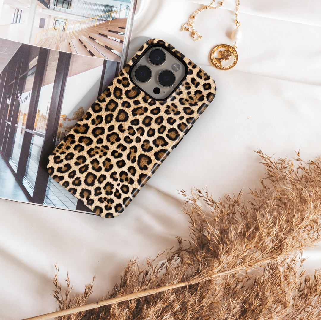 Leopard print phone case with brown and black animal fur pattern, trendy chic aesthetic protective cover for iPhone and Samsung