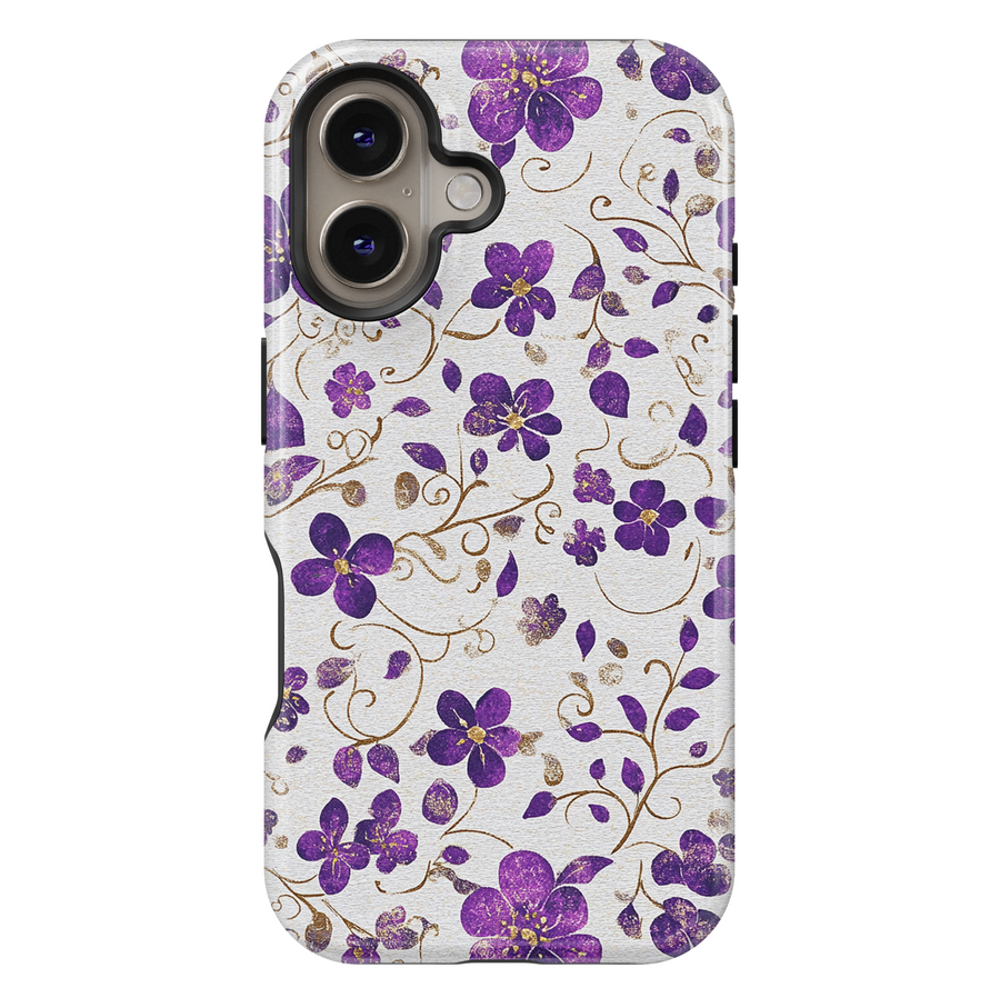 Purple floral iPhone case with shimmering gold accents and delicate vines on a light silver background. Elegant, girly, and perfect for a chic everyday look.