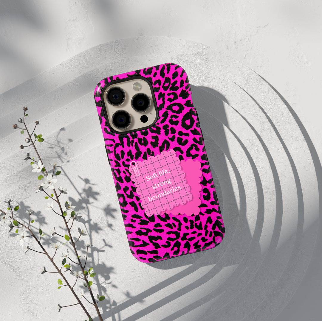 Hot pink leopard phone case with quote soft life strong boundaries on a protective iPhone and Samsung Galaxy phone case for women