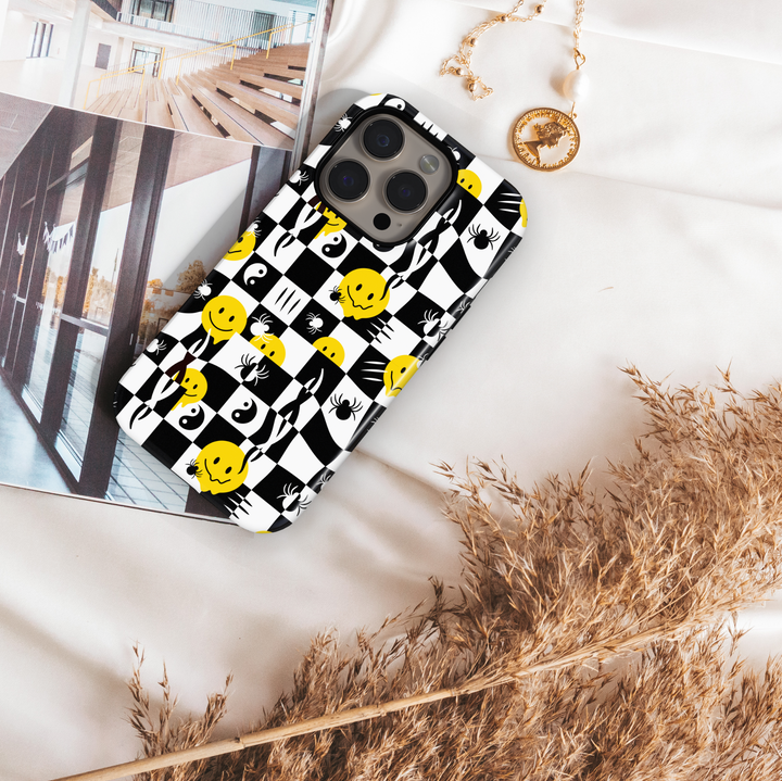 Checkered Halloween iPhone Case with Smiley Faces and Spiders – MagSafe iPhone 16 Pro Max Case for Girls