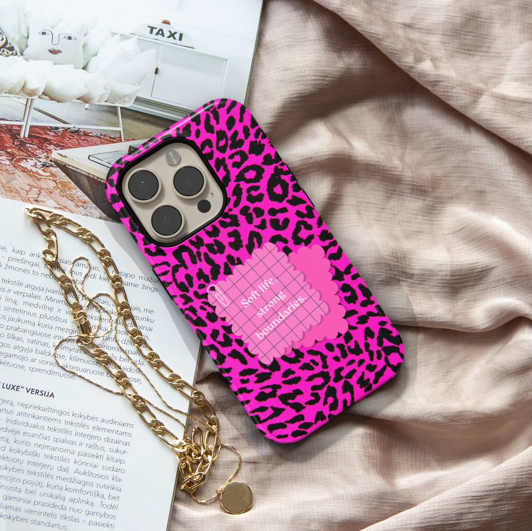 Hot pink leopard phone case with quote soft life strong boundaries on a protective iPhone and Samsung Galaxy phone case for women