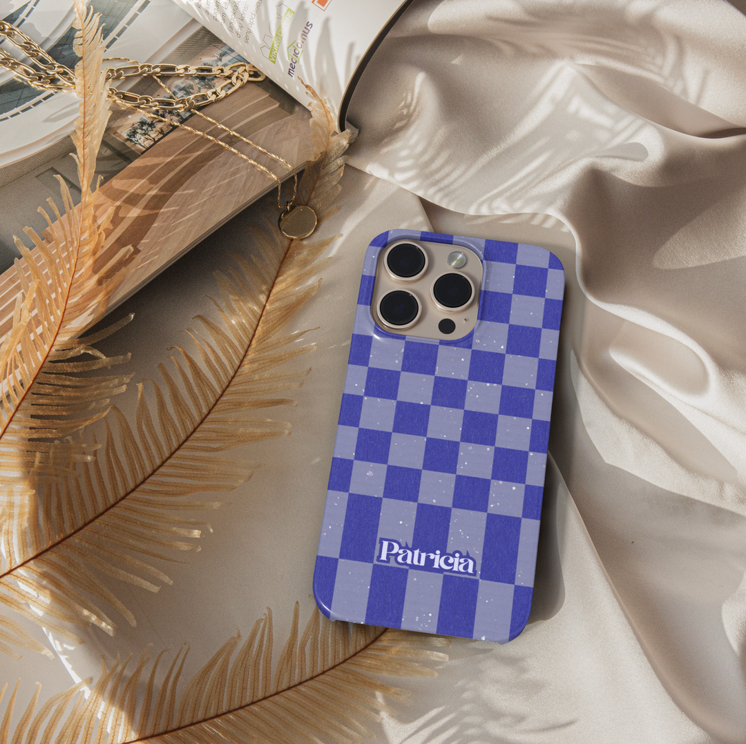 Purple and gray checkerboard iPhone case with retro grid design, trendy violet checkered aesthetic phone cover, protective iPhone 15, iPhone 14, iPhone 13 Pro Max case.