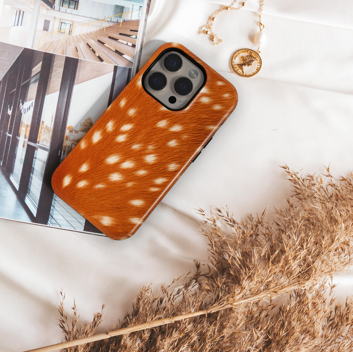Deer fur print phone case with brown and white spotted pattern, cozy aesthetic animal print protective cover for iPhone and Samsung