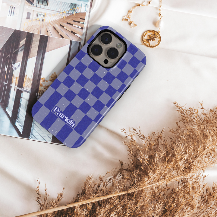 Purple and gray checkerboard iPhone case with retro grid design, trendy violet checkered aesthetic phone cover, protective iPhone 15, iPhone 14, iPhone 13 Pro Max case.