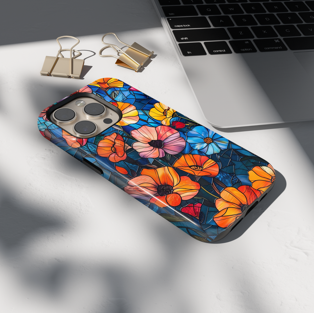 Colorful stained glass floral iPhone tough case with vibrant flowers and deep blue background