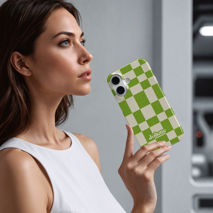 Green plaid iPhone case with oversized checkerboard design, trendy checkered phone cover in fresh green and cream, slim protective iPhone 15, iPhone 14, iPhone 13 Pro Max case. Modern aesthetic check pattern.