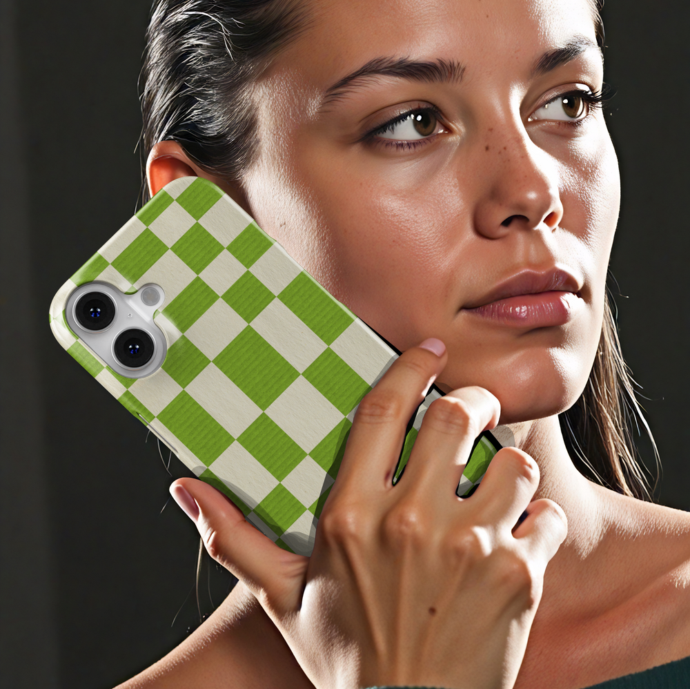 Green plaid iPhone case with oversized checkerboard design, trendy checkered phone cover in fresh green and cream, slim protective iPhone 15, iPhone 14, iPhone 13 Pro Max case. Modern aesthetic check pattern.