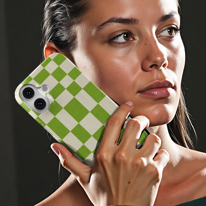 Green plaid iPhone case with oversized checkerboard design, trendy checkered phone cover in fresh green and cream, slim protective iPhone 15, iPhone 14, iPhone 13 Pro Max case. Modern aesthetic check pattern.