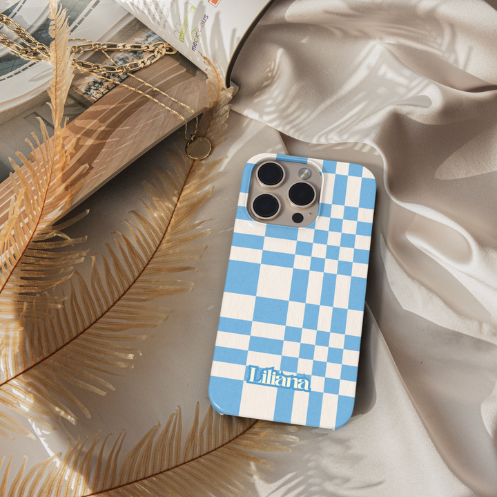 Oversized blue plaid iPhone case, modern checkered phone cover in light blue and cream, slim protective case for iPhone 15, iPhone 14, iPhone 13 Pro Max. Trendy grid design with minimalist style.