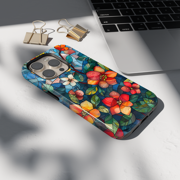 Colorful stained glass floral iPhone tough case with vibrant flowers and deep blue background