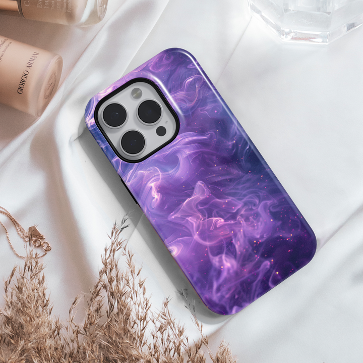 Purple and pink smoke swirl phone case with galaxy sparkles – dreamy aesthetic design compatible with iPhone 16, iPhone 15 Pro Max, Galaxy S24 Ultra, and MagSafe accessories.