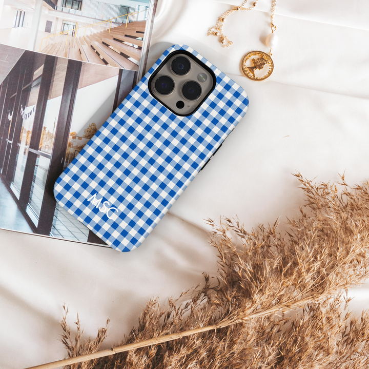 Blue gingham iPhone case, classic checkered phone cover in navy and white, slim protective case for iPhone 15, iPhone 14, iPhone 13 Pro Max. Stylish plaid design for everyday chic and timeless look.