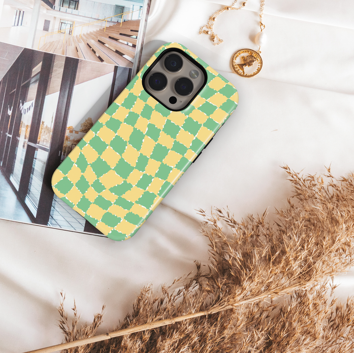 Green and yellow wavy checker phone case, aesthetic retro plaid design, trendy pastel check pattern phone cover for iPhone and Samsung