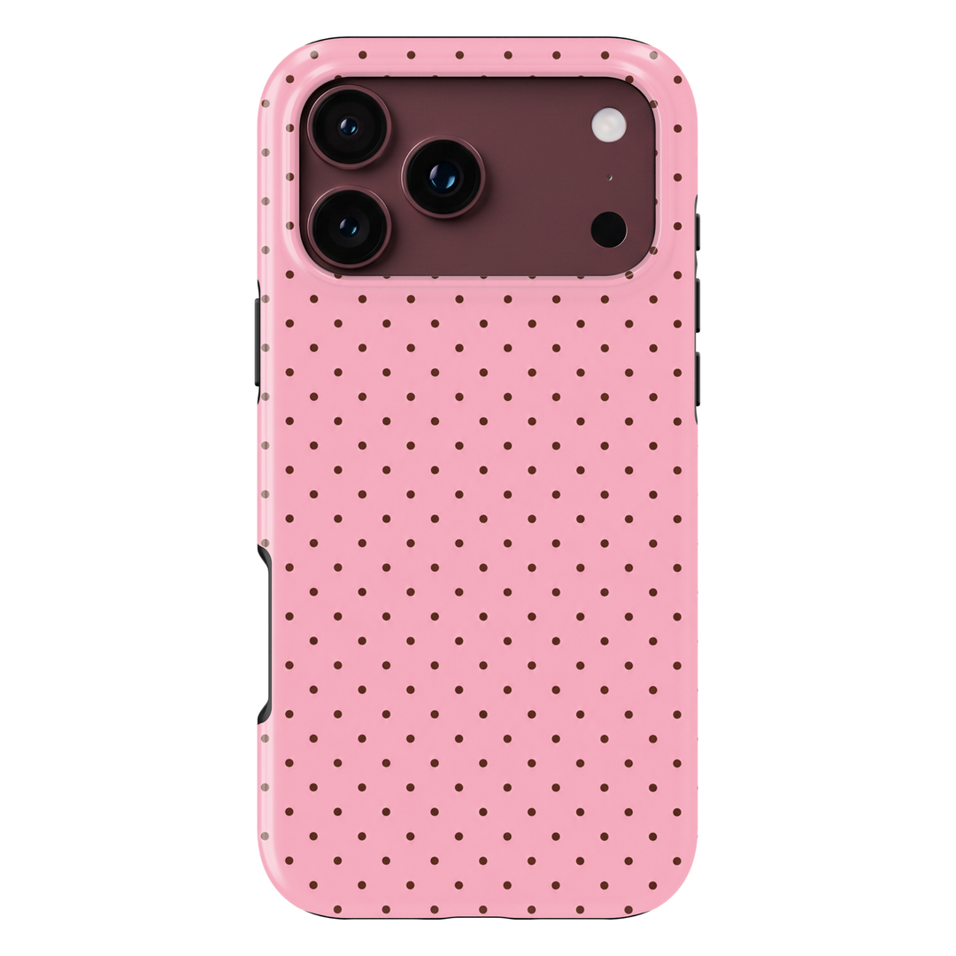 CASELIX Pink Espresso Dots iPhone 18 Pro Max tough phone case featuring a soft pastel pink background with tiny chocolate brown polka dots in a neat repeating pattern. Cute minimalist pink phone case for women with a glossy printed finish and trendy coquette-inspired aesthetic.