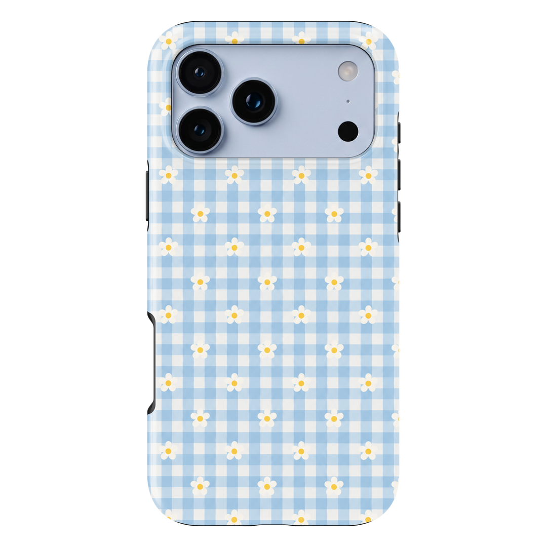 CASELIX Daisy Blue Gingham iPhone 18 Pro Max tough phone case featuring pastel baby blue and white gingham checks with tiny white daisy flowers and yellow centers. Cute floral checkered phone case for women with a glossy printed finish, soft girl aesthetic, and charming cottagecore-inspired design.