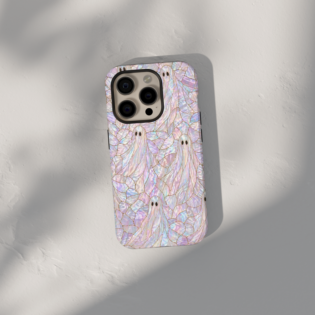 Cute ghost iPhone 17 Pro Max case with iridescent opal background and gold detailing, aesthetic Halloween MagSafe tough case.