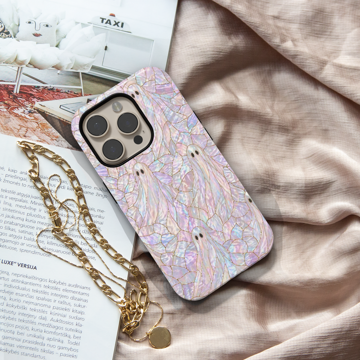 Cute ghost iPhone 17 Pro Max case with iridescent opal background and gold detailing, aesthetic Halloween MagSafe tough case.
