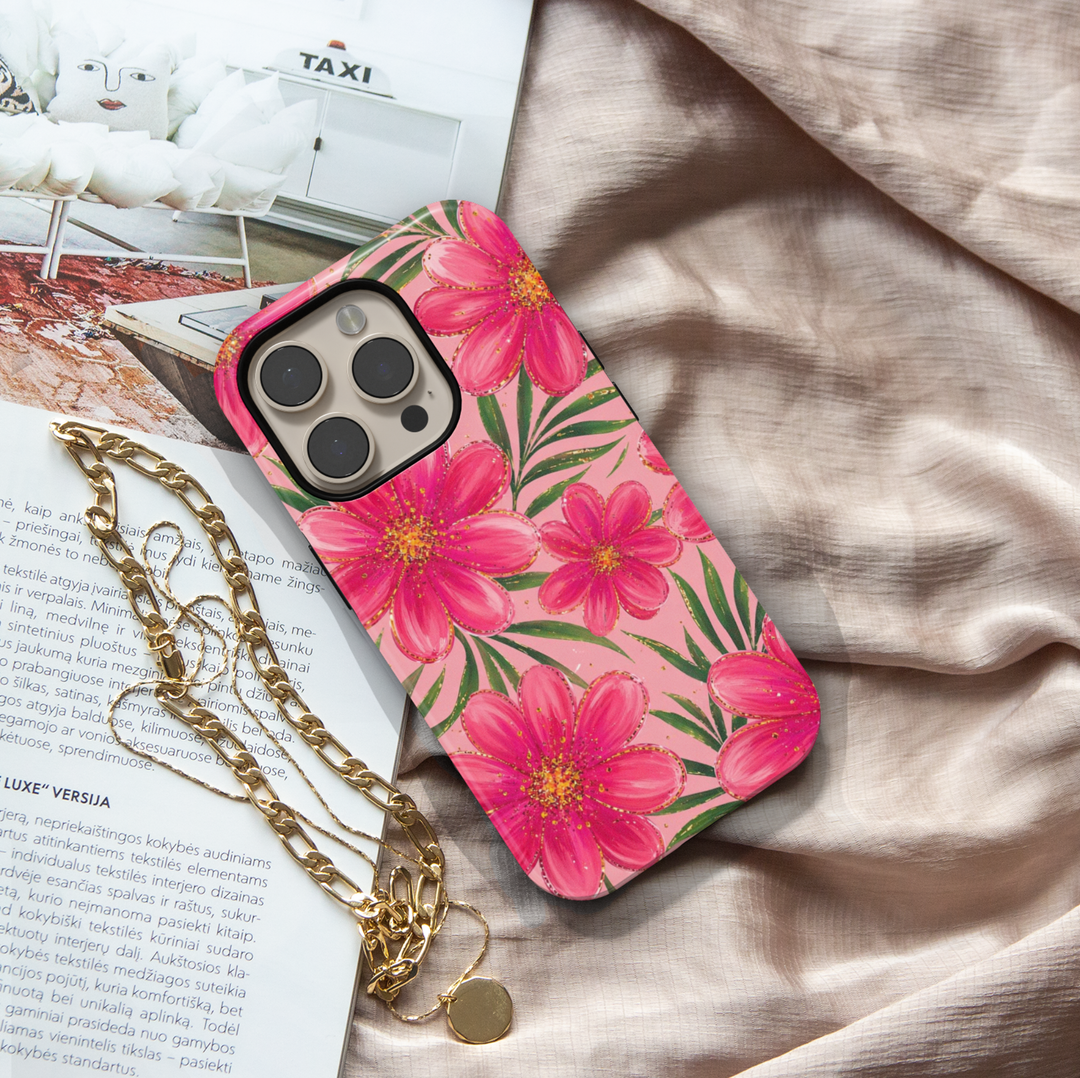 Pink floral iPhone 17 Pro Max case with bold hot pink flowers and green leaves on blush background, aesthetic MagSafe tough case.