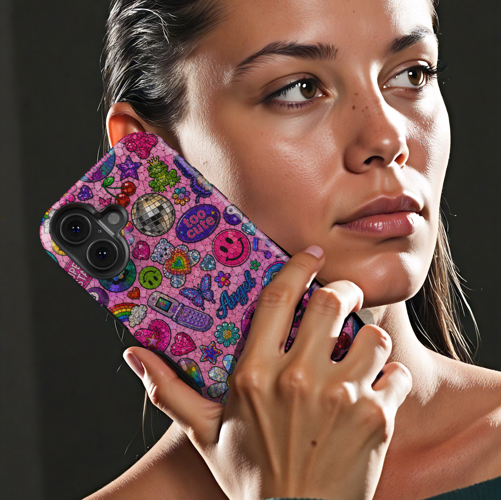 Cute pink Y2K iPhone case featuring colorful sticker icons, butterflies, smiley faces, hearts, cherries, flowers, and retro aesthetic artwork.