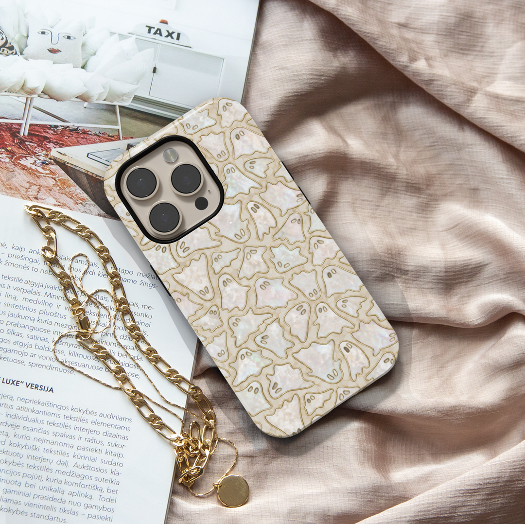 Cute ghost iPhone case featuring tiny ghost illustrations on a pearlescent opal background with elegant gold outlines.