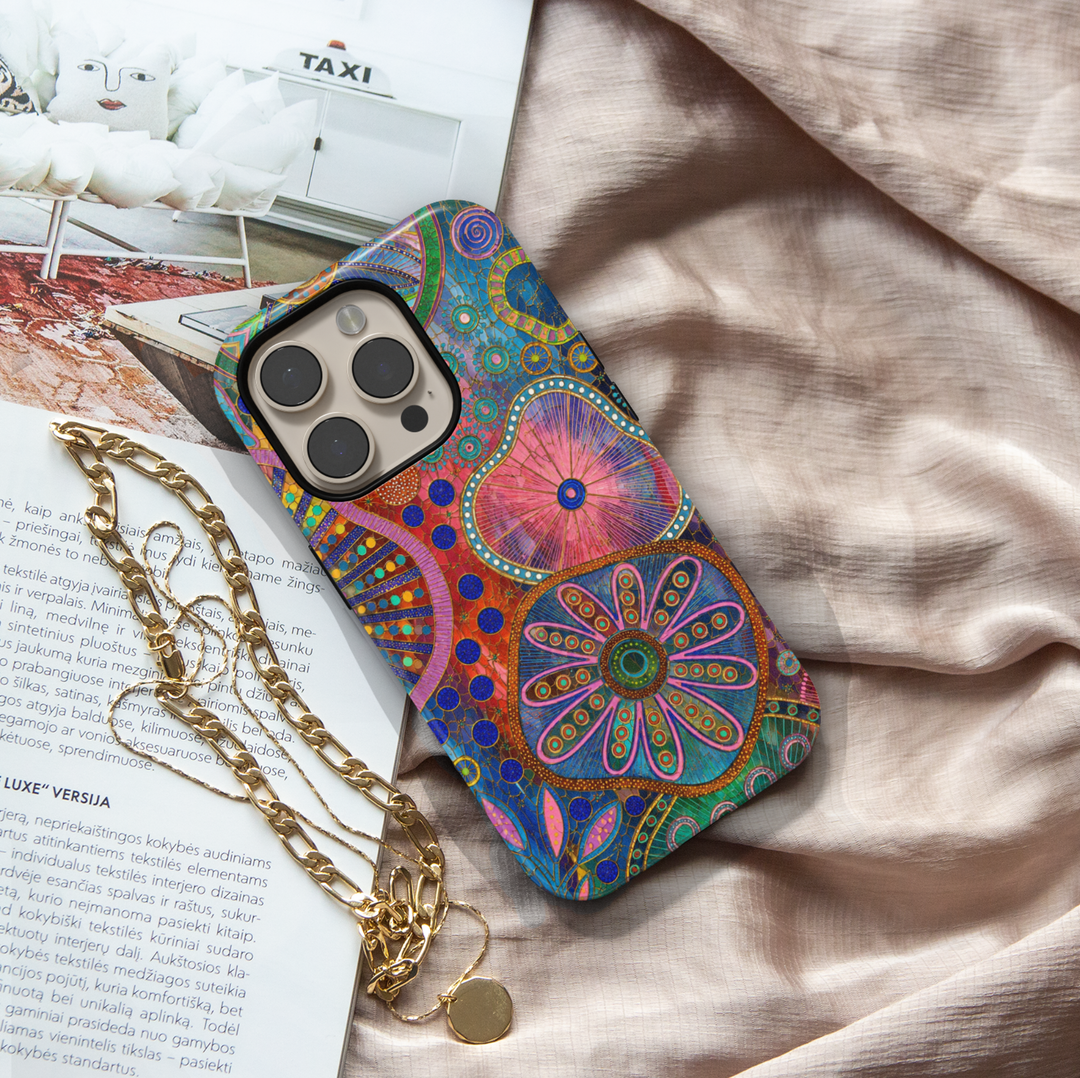 Colorful boho floral iPhone case featuring abstract flowers, vibrant geometric patterns, and artistic botanical design.
