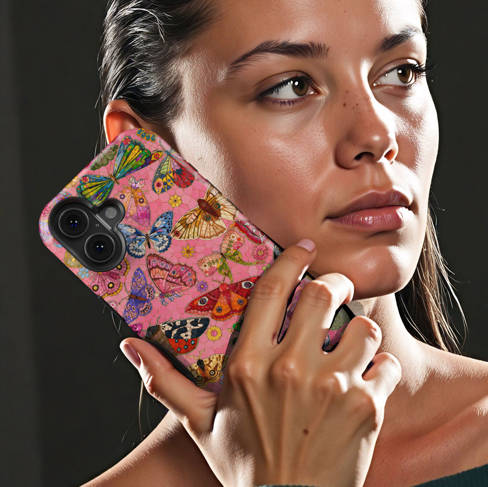 Pink butterfly iPhone case featuring colorful butterflies, moths, flowers, and whimsical nature-inspired artwork.