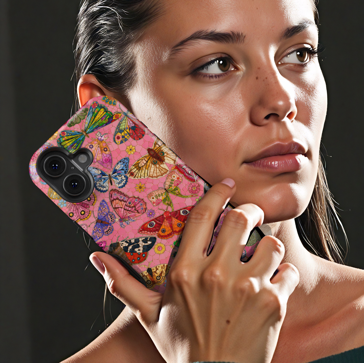 Pink butterfly iPhone case featuring colorful butterflies, moths, flowers, and whimsical nature-inspired artwork.
