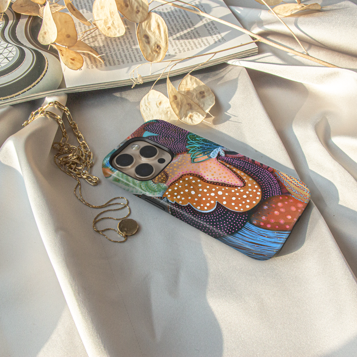 Abstract woman iPhone case featuring colorful modern portrait artwork with boho patterns, textured details, and artistic contemporary design.