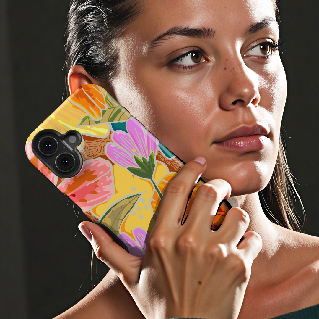 Colorful floral iPhone case featuring oversized wildflowers, botanical leaves, and vibrant retro-inspired floral artwork.