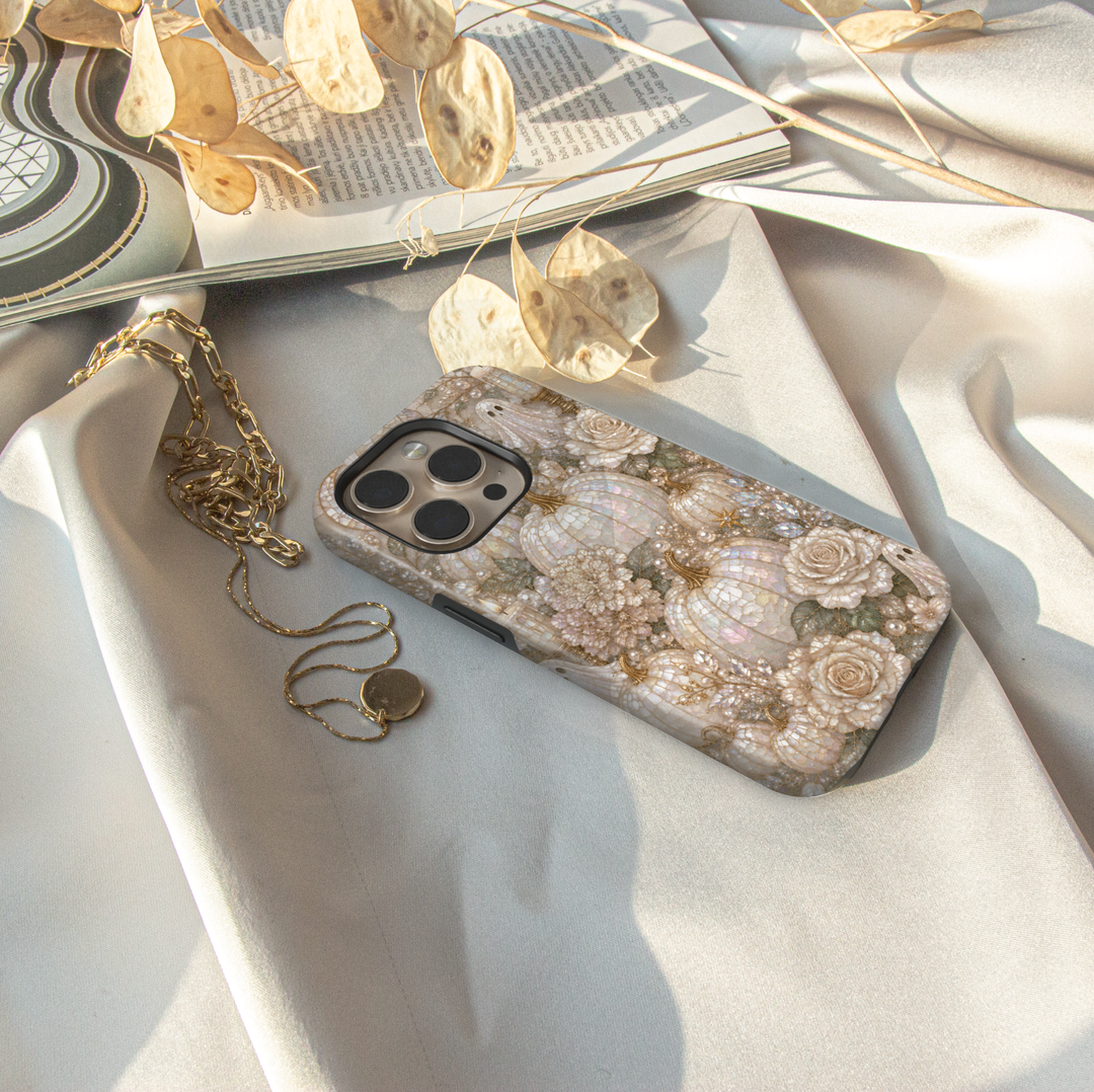 Elegant iPhone case featuring pearl pumpkins, ivory roses, delicate flowers, and luxurious neutral autumn artwork.