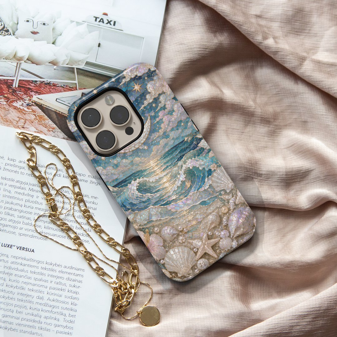 Elegant ocean wave iPhone case featuring moonlit sea, pearlescent seashells, starfish, and luxurious coastal artwork.