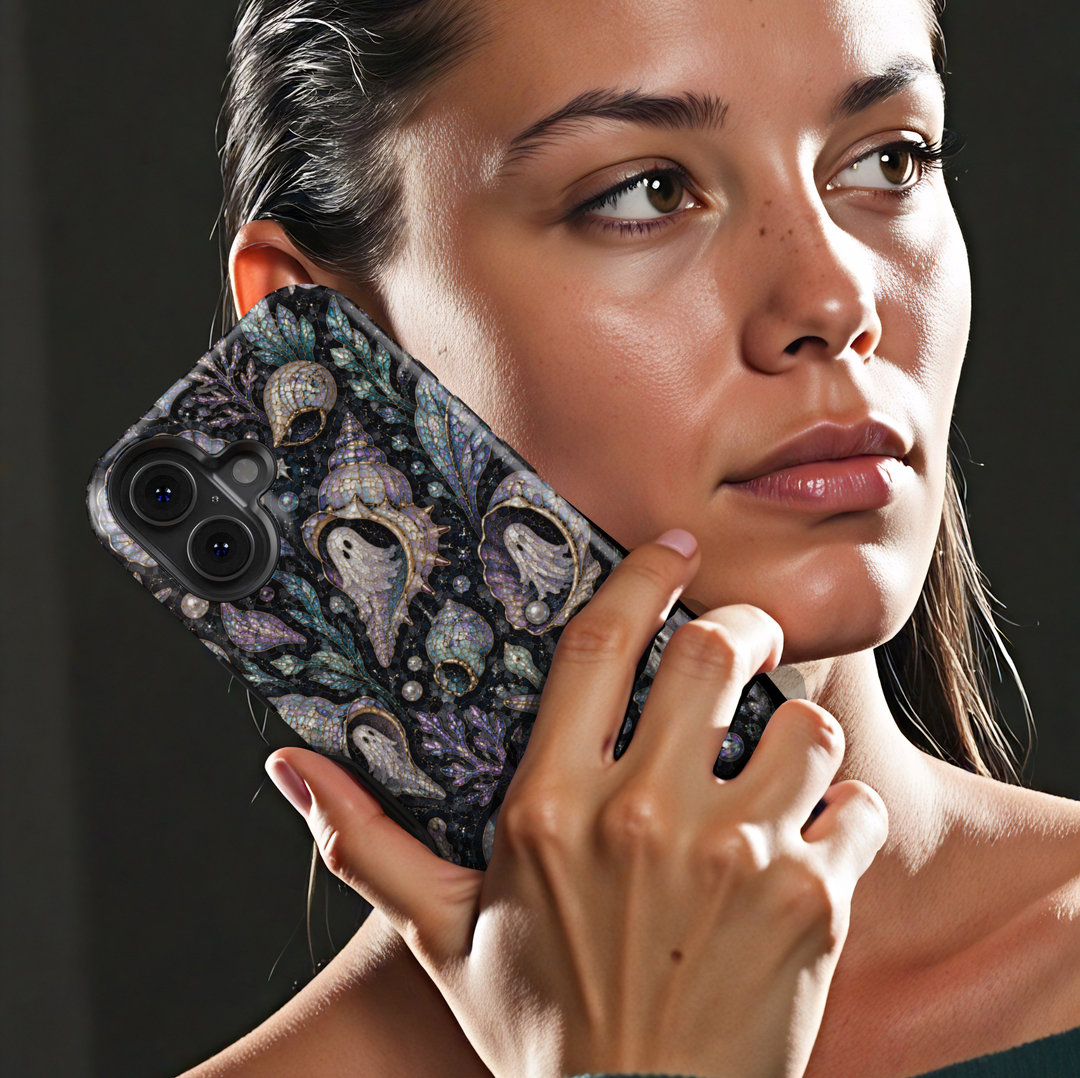 Midnight coastal Halloween iPhone case featuring pearl ghosts inside seashells with starfish, coral, sea glass, pearls, and iridescent ocean details.