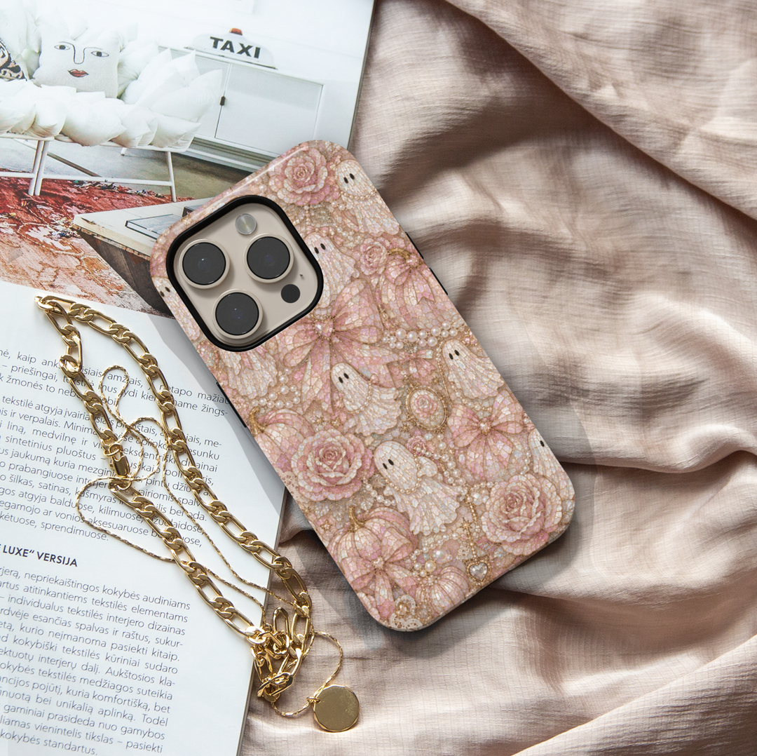 Blush Ghost Coquette iPhone case with pearl ghosts, pink satin bows, pearl pumpkins, roses, vintage cameo, lace, and elegant Halloween aesthetic.