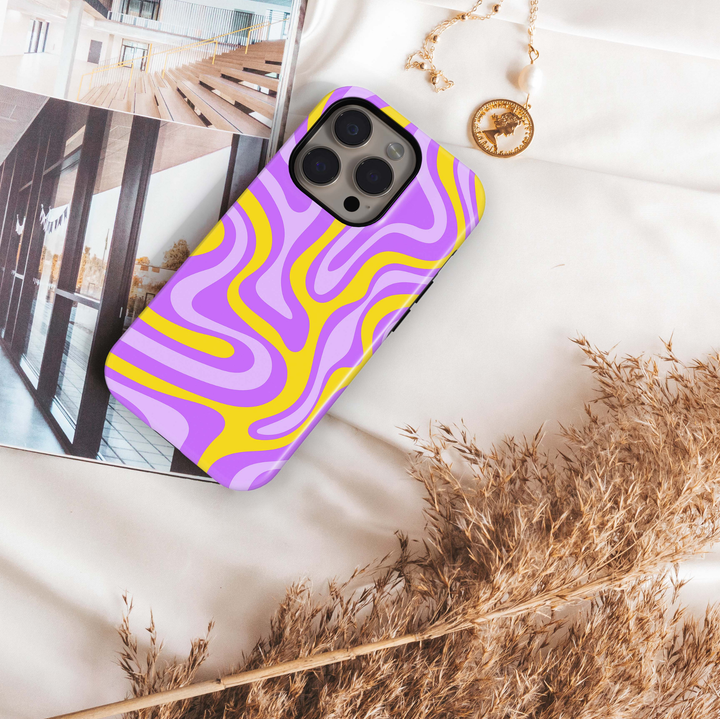 Lemon Lavender iPhone 18 Pro Max MagSafe case featuring groovy abstract waves in lavender, violet, lilac and bright lemon yellow, a colorful retro tough iPhone 18 Pro phone case with bold wavy pattern and MagSafe compatibility.