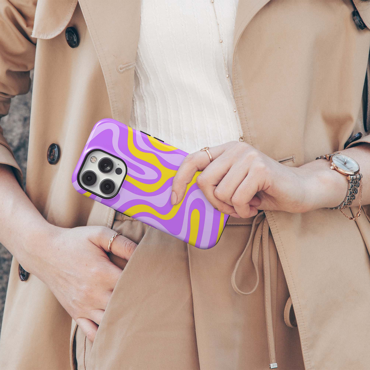 Lemon Lavender iPhone 18 Pro Max MagSafe case featuring groovy abstract waves in lavender, violet, lilac and bright lemon yellow, a colorful retro tough iPhone 18 Pro phone case with bold wavy pattern and MagSafe compatibility.