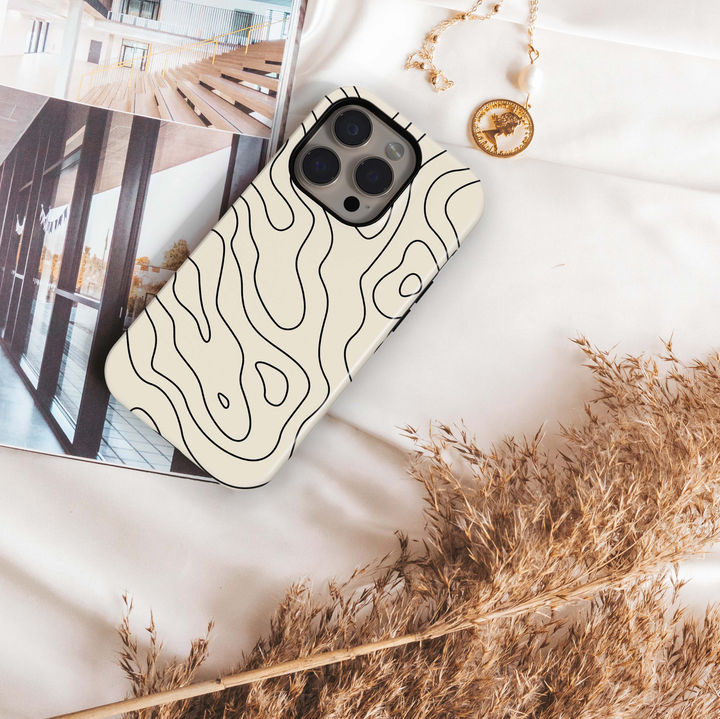 Contour Muse iPhone 18 Pro Max MagSafe case with flowing black abstract contour lines over a warm ivory cream background, a minimalist neutral tough iPhone 18 Pro phone case with modern organic line art and MagSafe compatibility.
