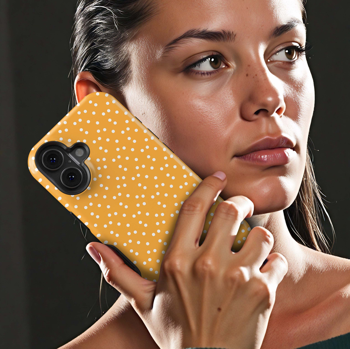 Golden Freckle orange polka dot iPhone 18 Pro Max MagSafe case with scattered white dots on a warm golden-orange background, a cute retro-inspired tough iPhone 18 Pro phone case with MagSafe compatibility.
