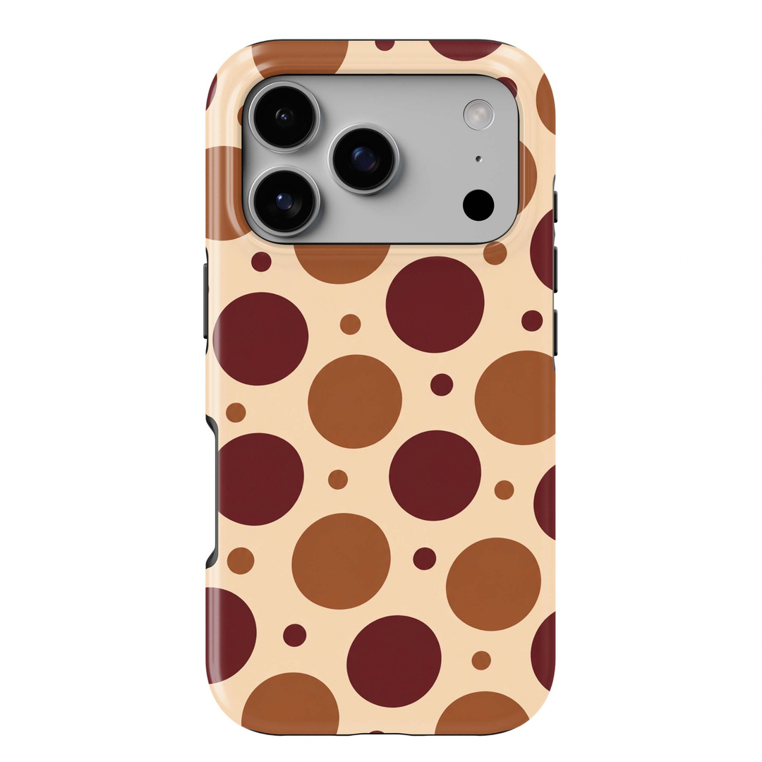 Harvest Bubbles Tough iPhone Case featuring oversized and mini burgundy, caramel and chestnut polka dots on a warm creamy beige background.