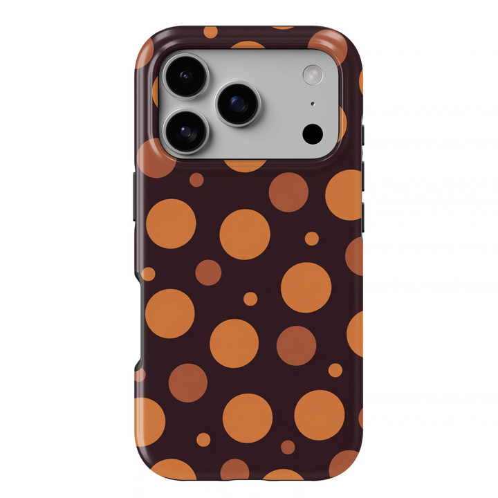 Pumpkin Pop Tough iPhone Case featuring large and small pumpkin orange, caramel and terracotta polka dots on a deep espresso brown background.