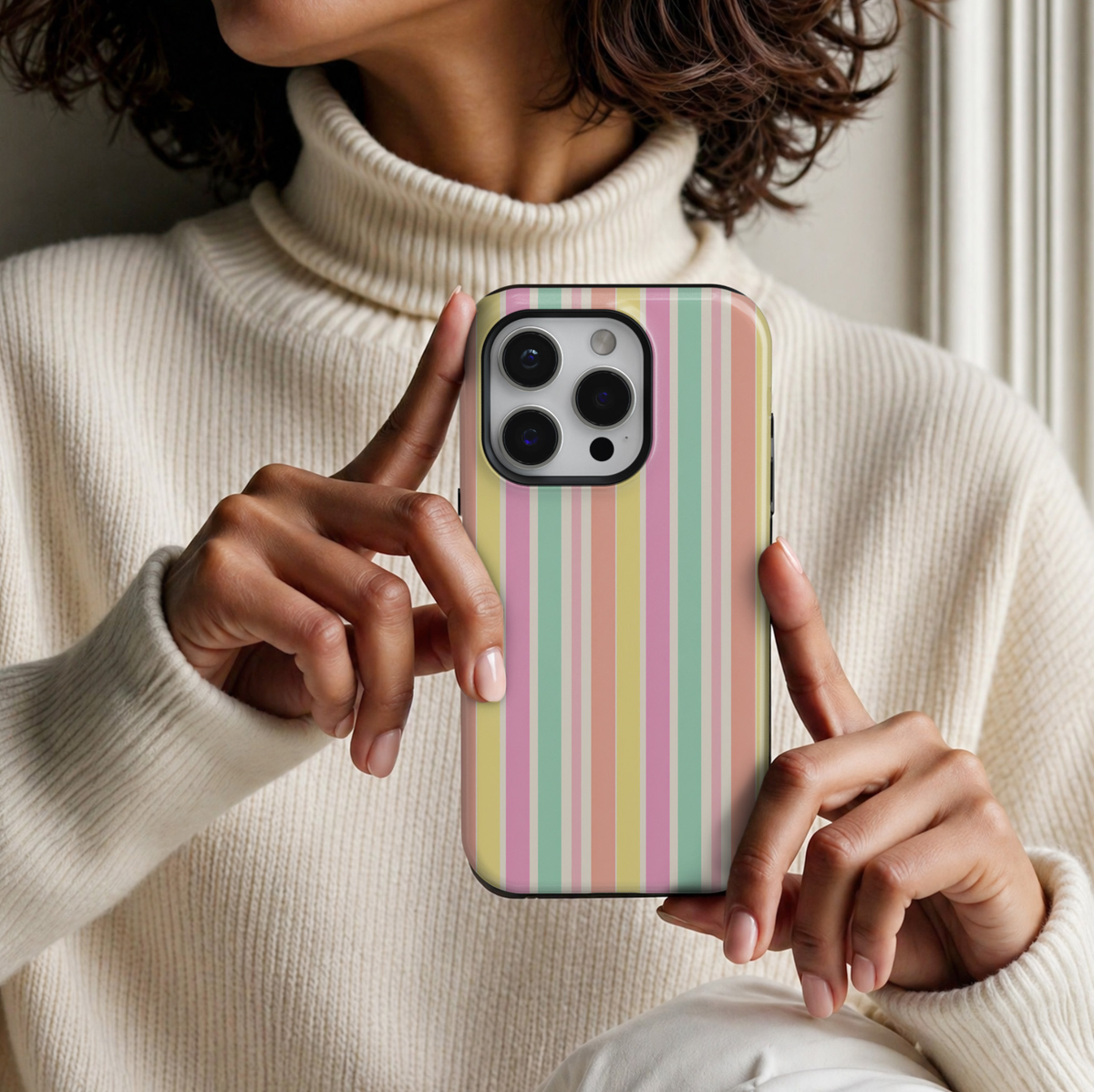 CASELIX Candy Stripe iPhone 18 Pro Max tough phone case featuring pastel pink, mint green, soft yellow, peach, and cream vertical stripes. Cute multicolor striped phone case for women with a glossy printed finish, trendy preppy aesthetic, and colorful retro-inspired design.