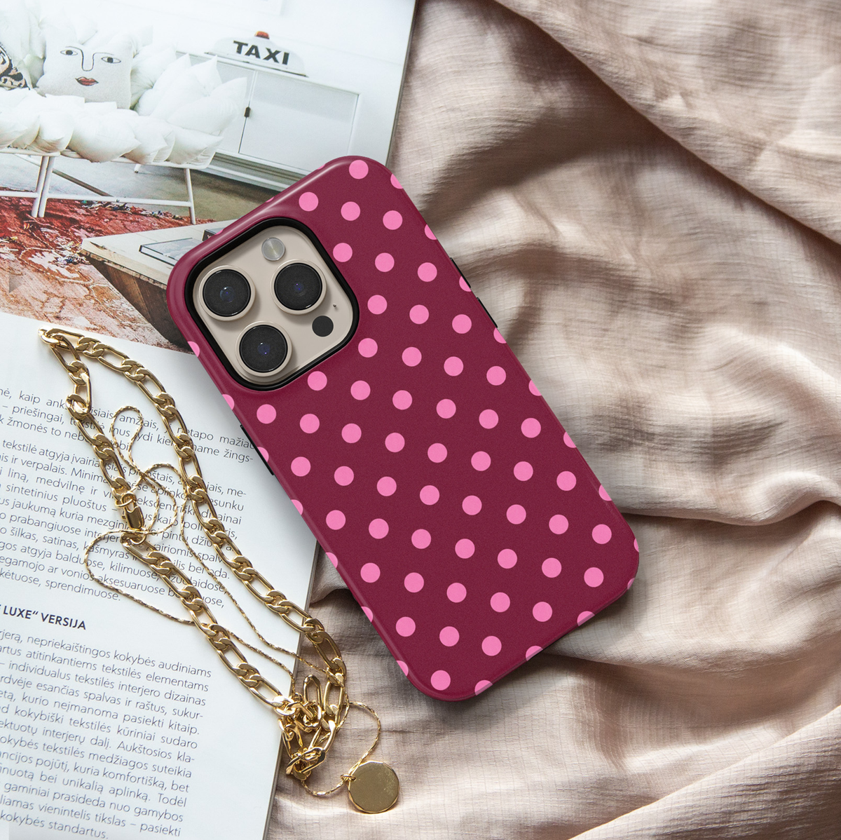 CASELIX Berry Blush Dots iPhone 18 Pro Max tough phone case featuring a deep raspberry burgundy background with bright pink polka dots in a repeating pattern. Trendy pink and burgundy polka dot phone case for women with a glossy printed finish and playful preppy aesthetic.