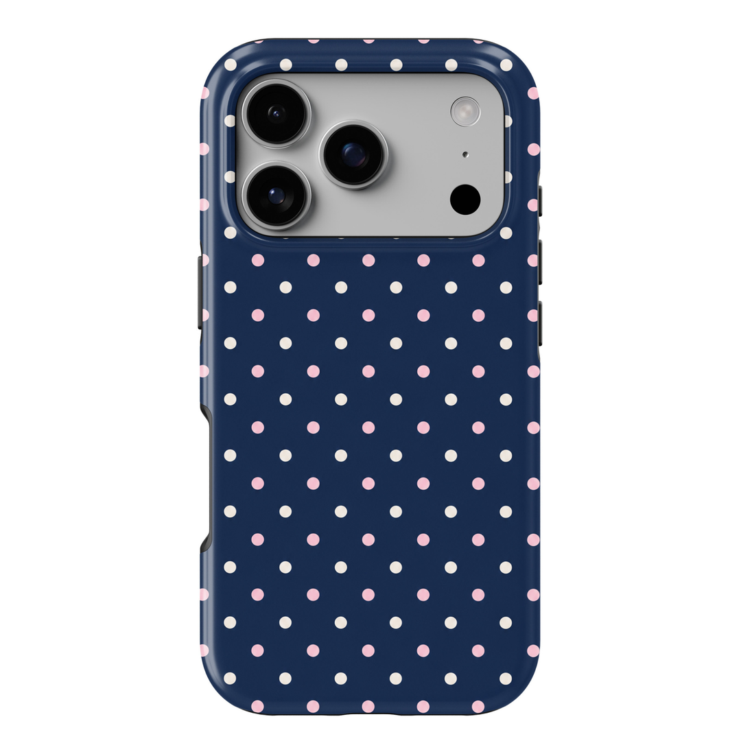 CASELIX Navy Blush Dots iPhone 18 Pro Max tough phone case featuring a deep navy blue background with alternating pastel pink and ivory polka dots. Cute preppy polka dot phone case for women with a glossy printed finish, minimalist aesthetic, and timeless feminine design.
