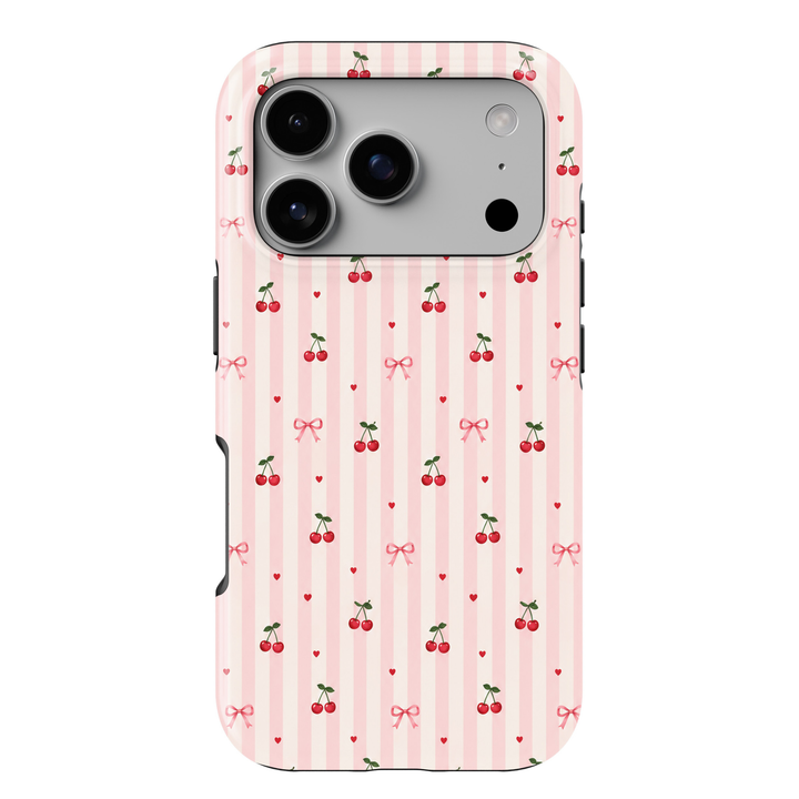 CASELIX Cherry Sweetheart Stripes iPhone 18 Pro Max tough phone case featuring pastel pink and ivory vertical stripes decorated with tiny red cherries, pink ribbon bows, and miniature red hearts. Cute coquette aesthetic phone case for women with a glossy printed finish and romantic cherry pattern.
